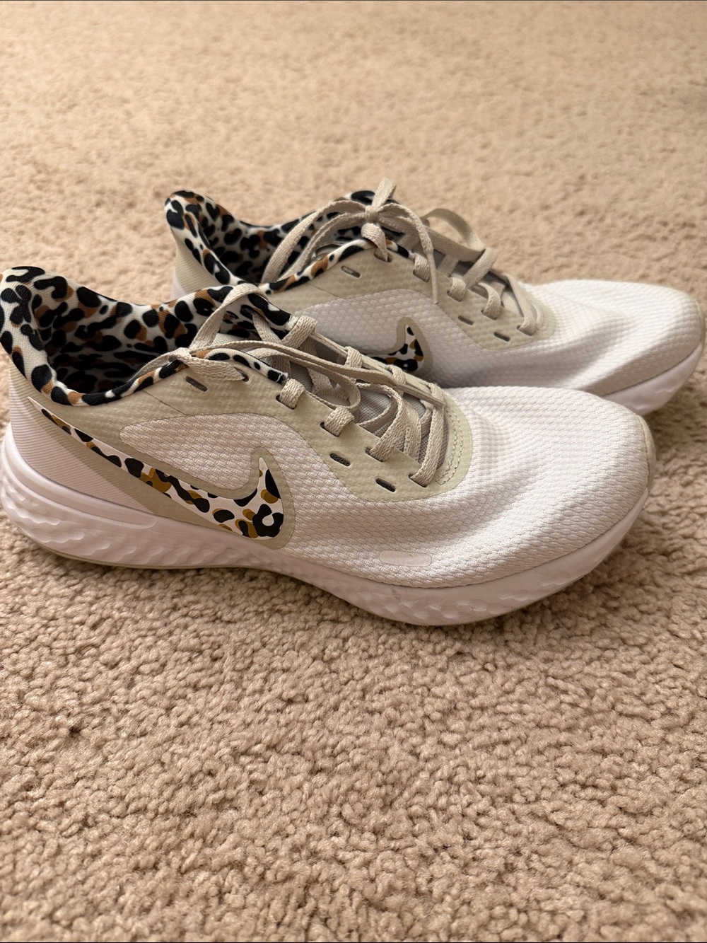 Nike Women's White Athletic Shoes with Leopard Accent